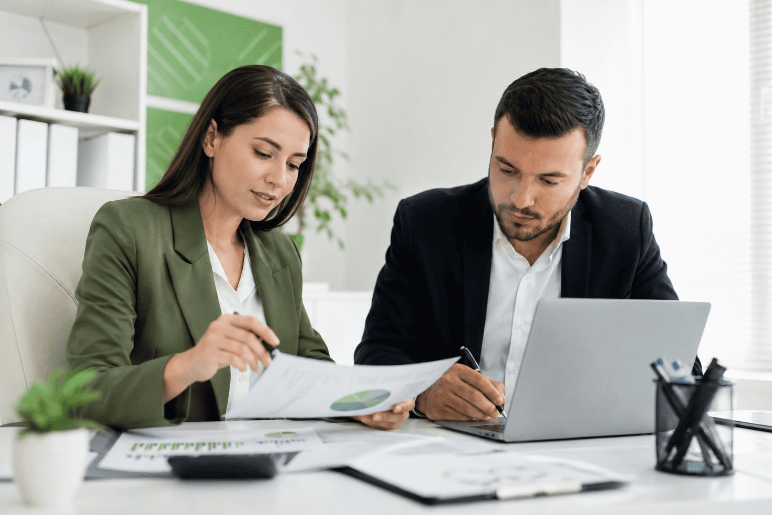 Healthcare team reviewing medical billing audit report